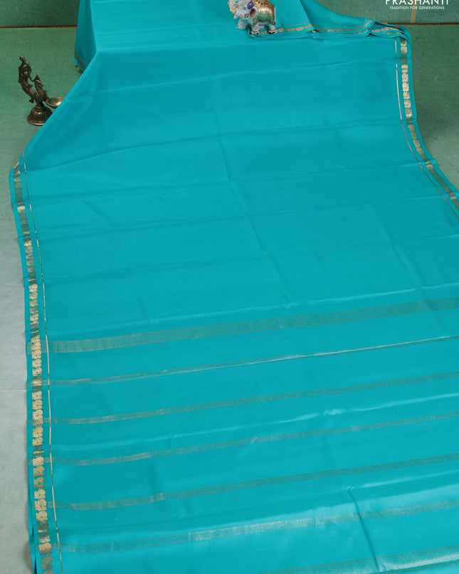 Pure mysore silk saree teal blue with plain body and small zari woven border