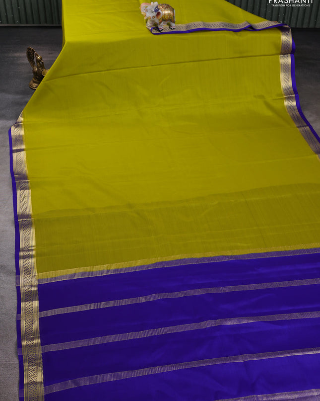 Pure mysore silk saree lime yellow and blue with plain body and zari woven border