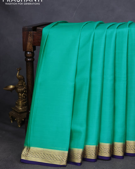 Pure mysore silk saree teal blue and navy blue with plain body and zari woven border