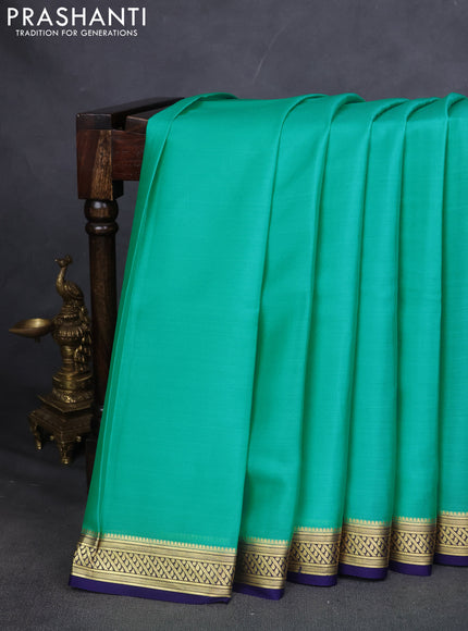 Pure mysore silk saree teal blue and navy blue with plain body and zari woven border
