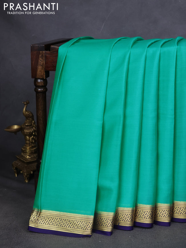 Pure mysore silk saree teal blue and navy blue with plain body and zari woven border