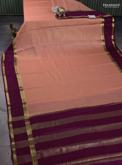 Pure mysore silk saree peach shade and purple with allover zari checked pattern and rettapet zari woven border