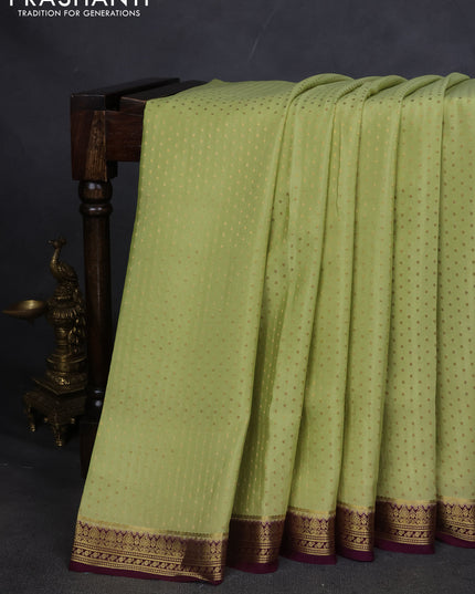 Pure mysore silk saree pista green and deep purple with allover zari woven butta weaves and zari woven border