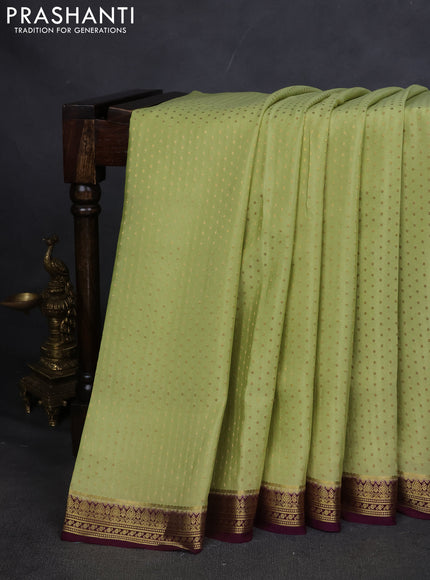 Pure mysore silk saree pista green and deep purple with allover zari woven butta weaves and zari woven border