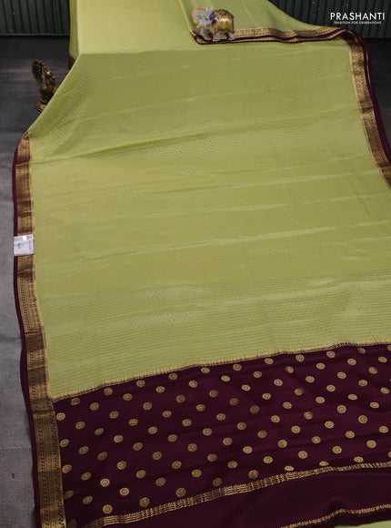 Pure mysore silk saree pista green and deep purple with allover zari woven butta weaves and zari woven border