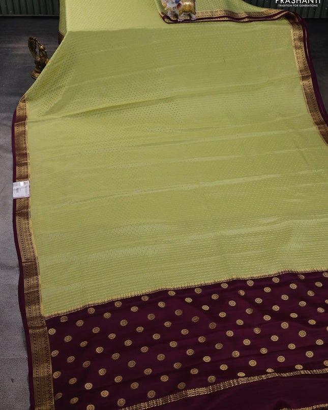 Pure mysore silk saree pista green and deep purple with allover zari woven butta weaves and zari woven border