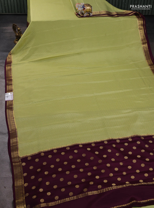 Pure mysore silk saree pista green and deep purple with allover zari woven butta weaves and zari woven border