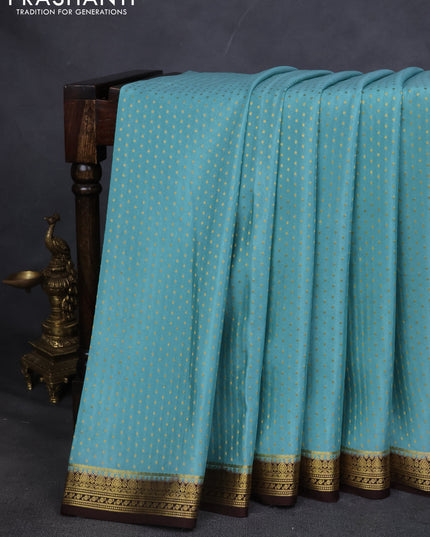 Pure mysore silk saree pastel blue and brown with allover zari woven butta weaves and zari woven border