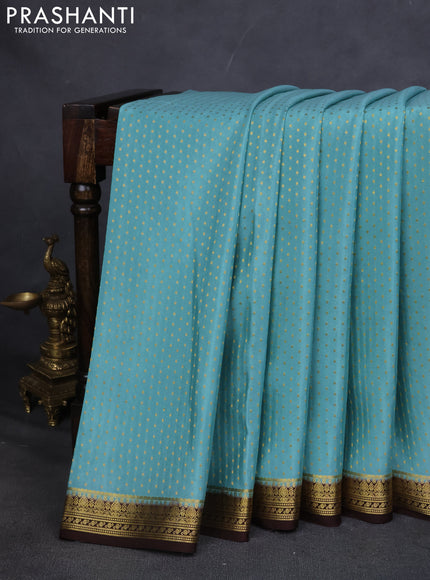 Pure mysore silk saree pastel blue and brown with allover zari woven butta weaves and zari woven border