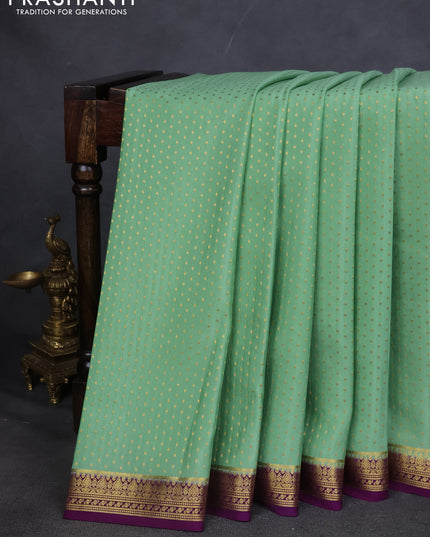 Pure mysore silk saree pastel green and purple with allover zari woven butta weaves and zari woven border