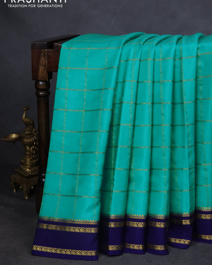 Pure mysore silk saree teal blue and navy blue with allover zari checked pattern and rettapet zari woven border