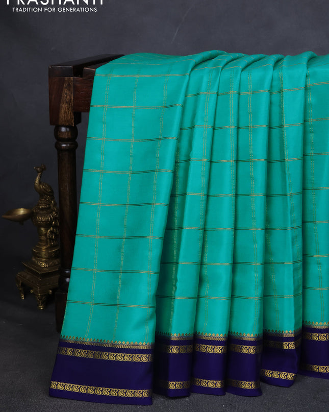 Pure mysore silk saree teal blue and navy blue with allover zari checked pattern and rettapet zari woven border