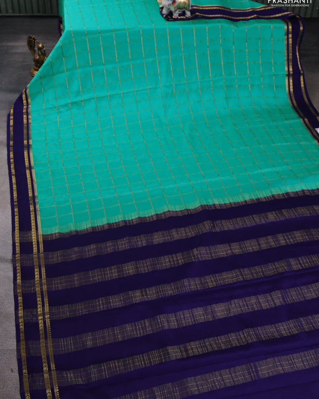 Pure mysore silk saree teal blue and navy blue with allover zari checked pattern and rettapet zari woven border