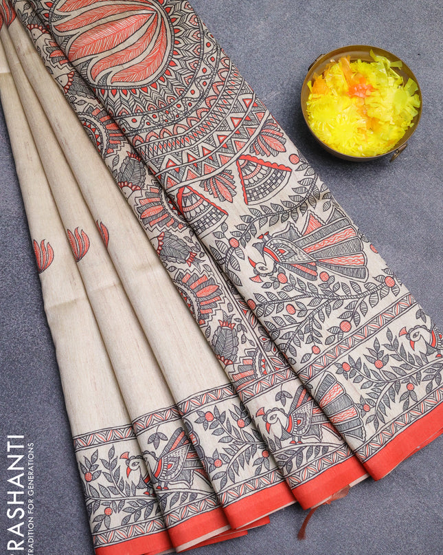 Semi tussar saree cream and orange with butta prints and madhubani printed pallu