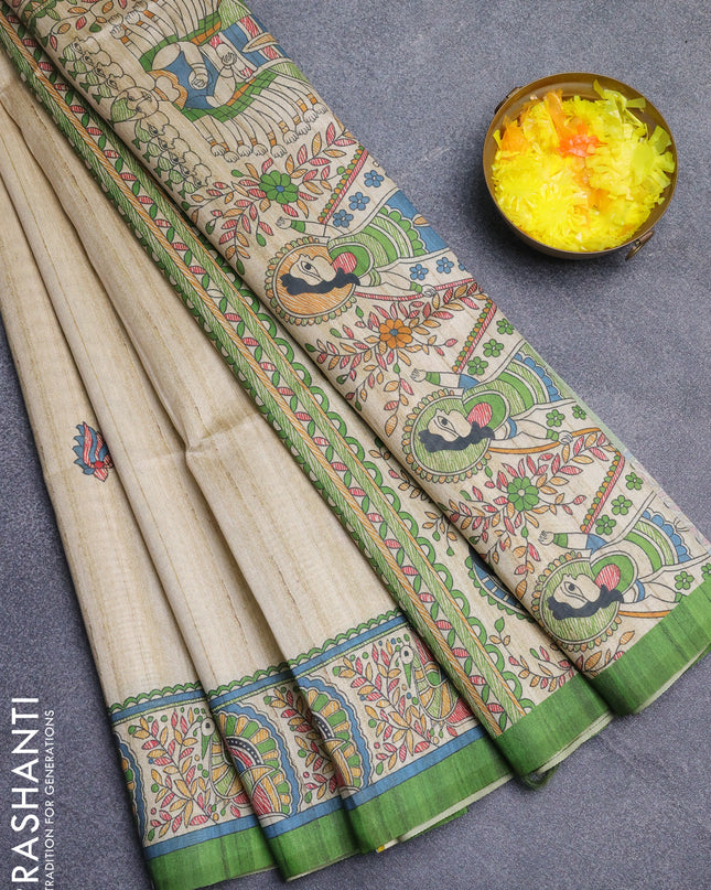 Semi tussar saree cream and mehendi green with butta prints and madhubani printed pallu