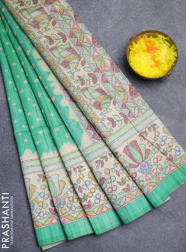 Semi tussar saree light green and beige with bandhani butta prints and madhubani printed pallu