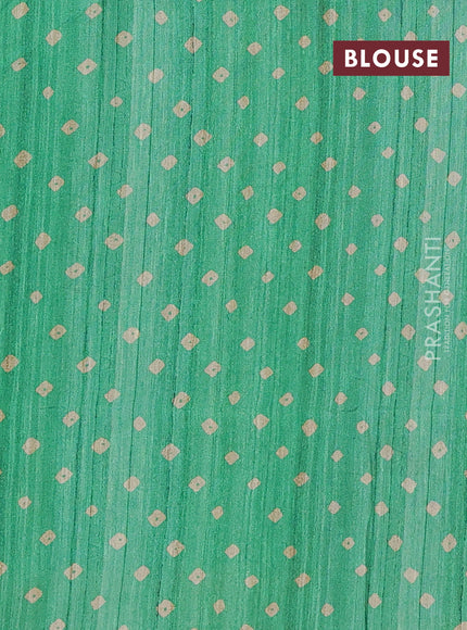 Semi tussar saree light green and beige with bandhani butta prints and madhubani printed pallu
