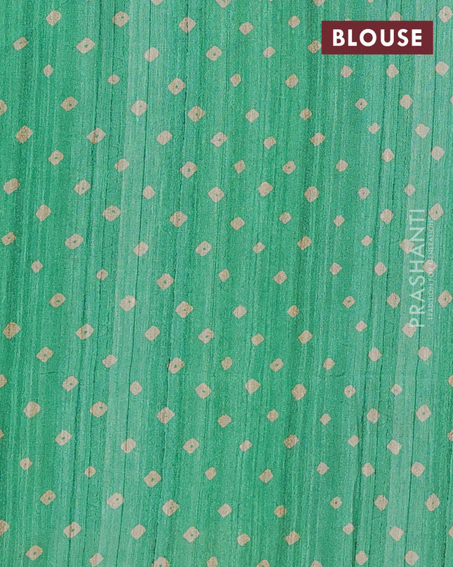 Semi tussar saree light green and beige with bandhani butta prints and madhubani printed pallu
