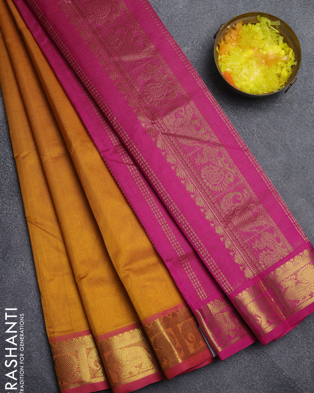 Silk cotton saree mustard yellow and pink with allover vairaosi pattern and annam & elephant zari woven border
