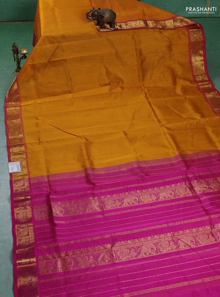 Silk cotton saree mustard yellow and pink with allover vairaosi pattern and annam & elephant zari woven border