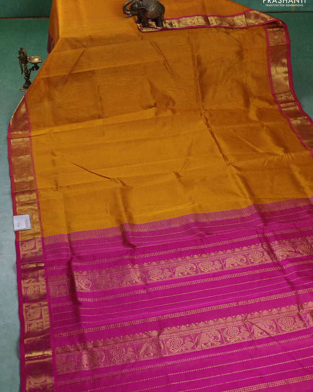 Silk cotton saree mustard yellow and pink with allover vairaosi pattern and annam & elephant zari woven border