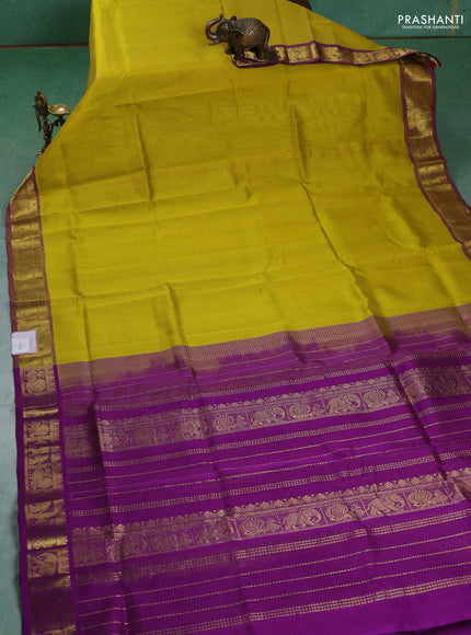 Silk cotton saree lime yellow and purple with allover vairaosi pattern and annam & elephant zari woven border