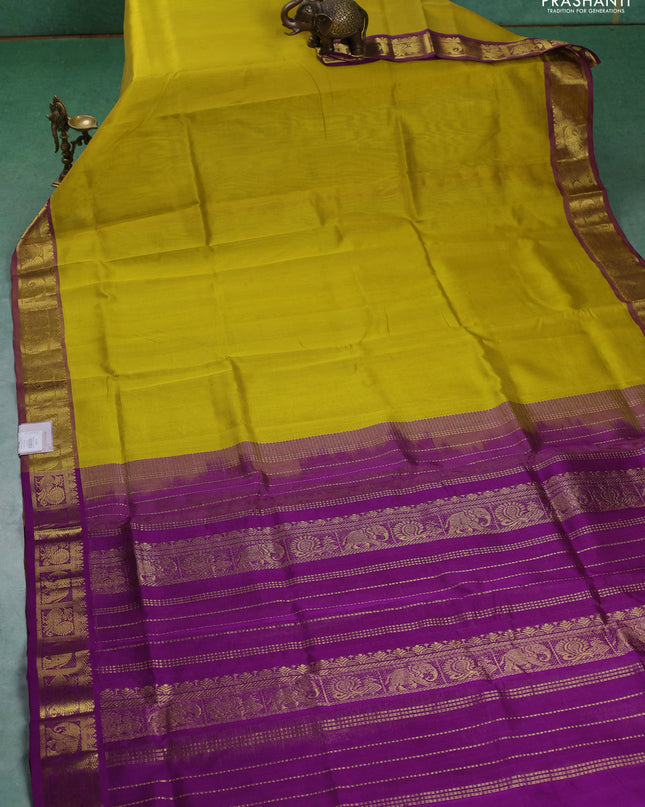 Silk cotton saree lime yellow and purple with allover vairaosi pattern and annam & elephant zari woven border