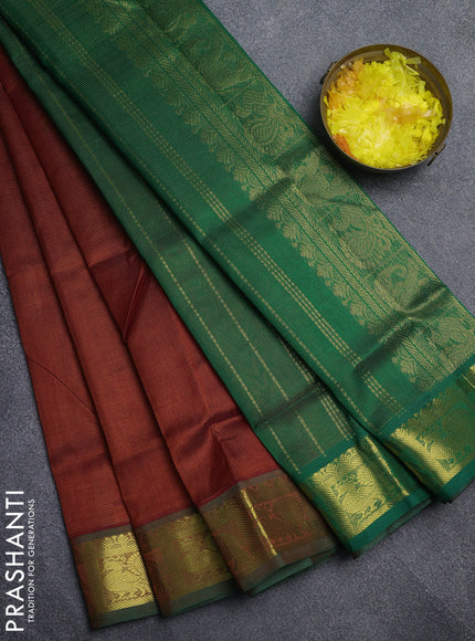 Silk cotton saree rust and green with allover vairaosi pattern and annam & elephant zari woven border