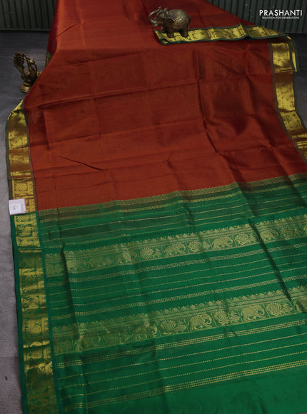 Silk cotton saree rust and green with allover vairaosi pattern and annam & elephant zari woven border