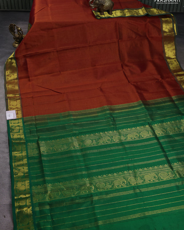 Silk cotton saree rust and green with allover vairaosi pattern and annam & elephant zari woven border