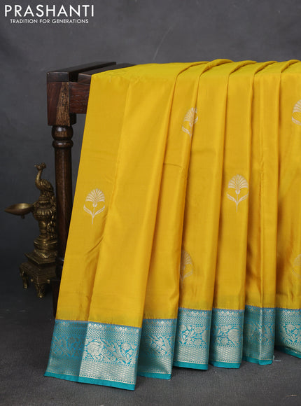 Bangalori silk saree yellow with teal green with zari woven floral buttas and zari woven border
