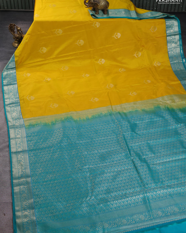 Bangalori silk saree yellow with teal green with zari woven floral buttas and zari woven border