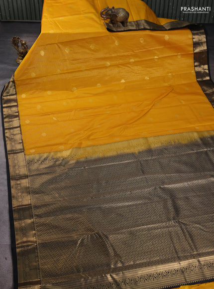 Bangalori silk saree mango yellow with black with allover zari woven stripes pattern and zari woven border