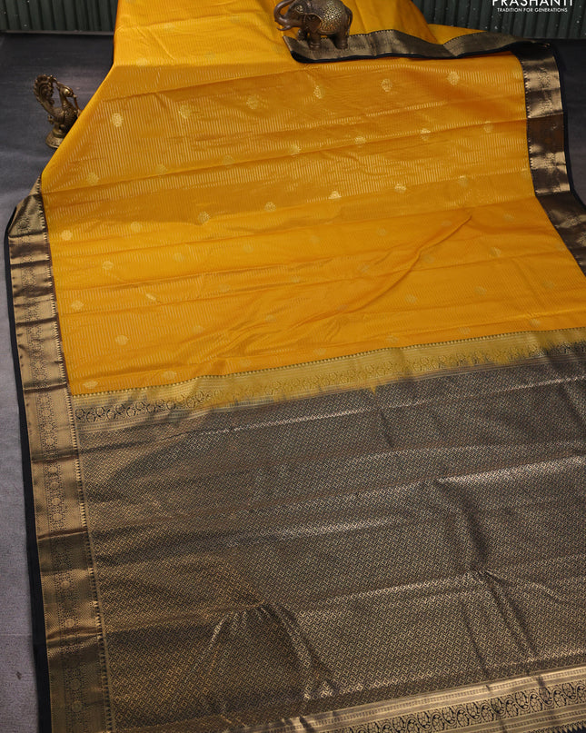 Bangalori silk saree mango yellow with black with allover zari woven stripes pattern and zari woven border