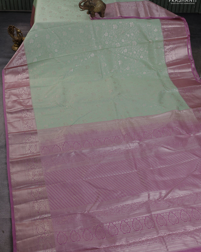 Bangalori silk saree pastel green and mauve pink with allover zari woven brocade weaves and zari woven border