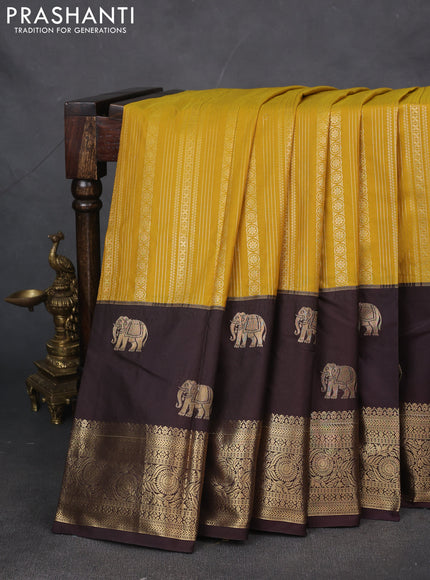 Bangalori silk saree mustard yellow and coffee brown with allover zari weaves and elephant butta border