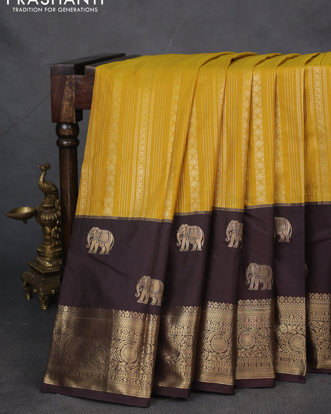 Bangalori silk saree mustard yellow and coffee brown with allover zari weaves and elephant butta border