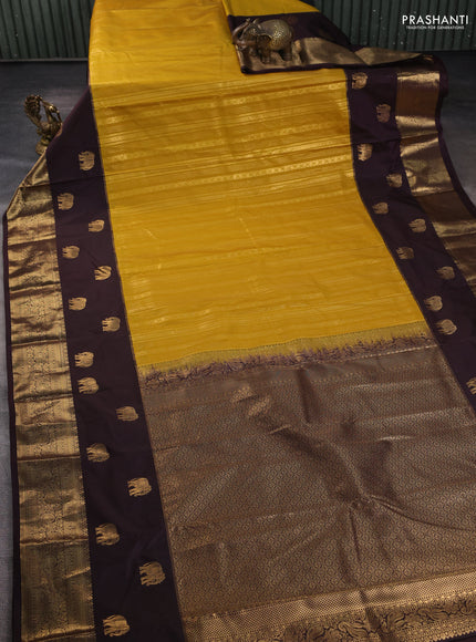 Bangalori silk saree mustard yellow and coffee brown with allover zari weaves and elephant butta border