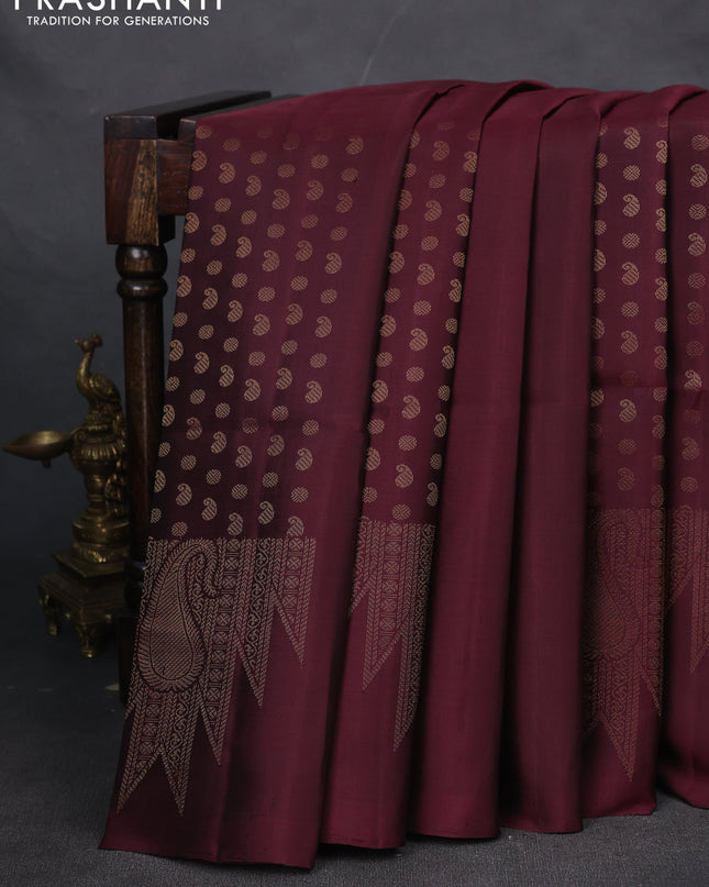 Pure soft silk saree maroon with allover paisley zari woven buttas and temple design zari woven border