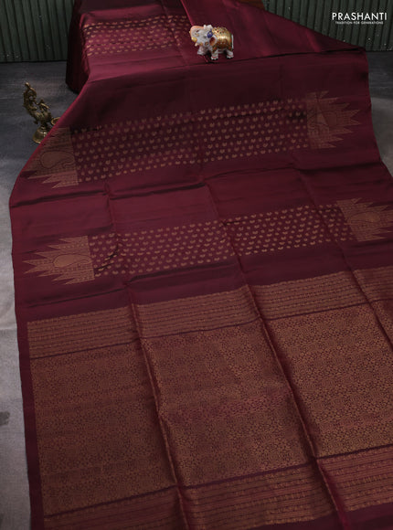 Pure soft silk saree maroon with allover paisley zari woven buttas and temple design zari woven border