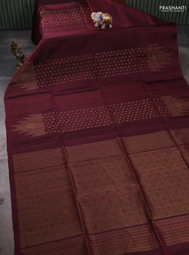Pure soft silk saree maroon with allover paisley zari woven buttas and temple design zari woven border