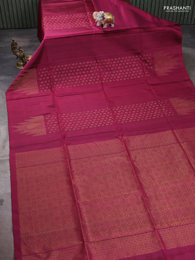 Pure soft silk saree dark magenta pink with allover paisley zari woven buttas and temple design zari woven border