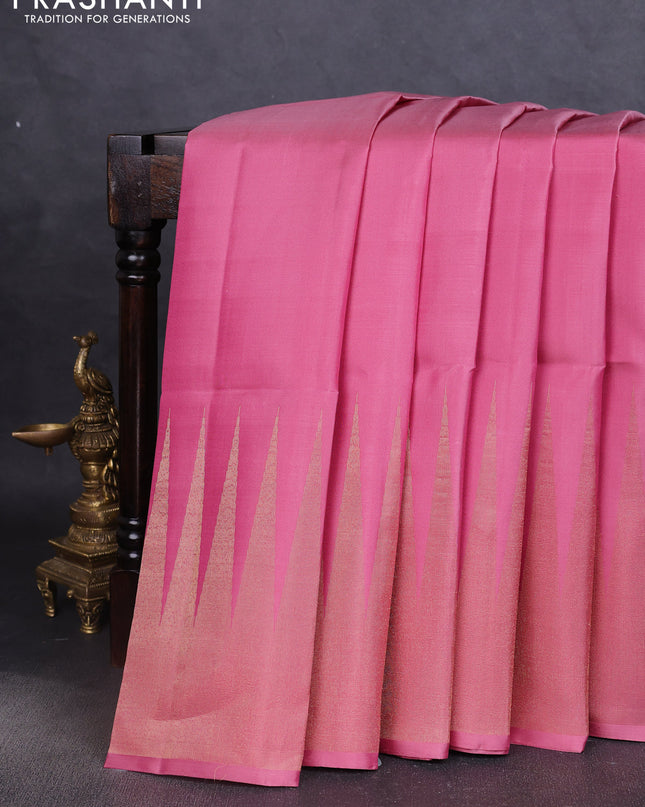 Pure soft silk saree pastel pink with plain body and temple design zari woven border