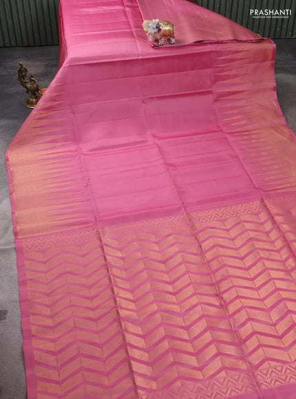 Pure soft silk saree pastel pink with plain body and temple design zari woven border