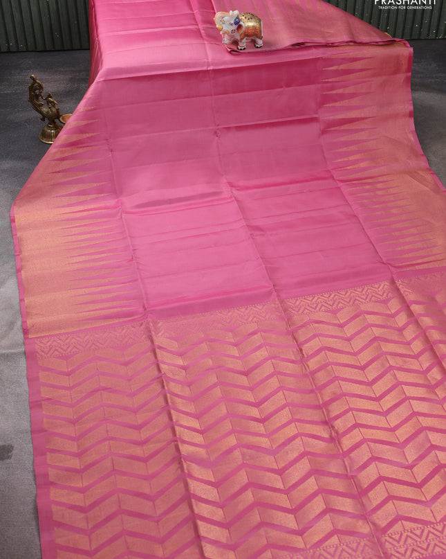 Pure soft silk saree pastel pink with plain body and temple design zari woven border