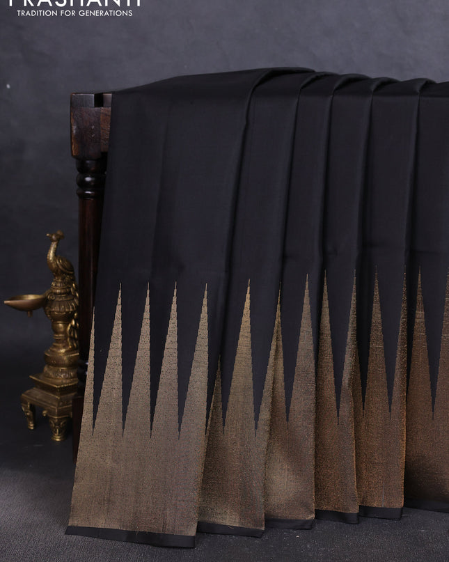 Pure soft silk saree black with plain body and temple design zari woven border