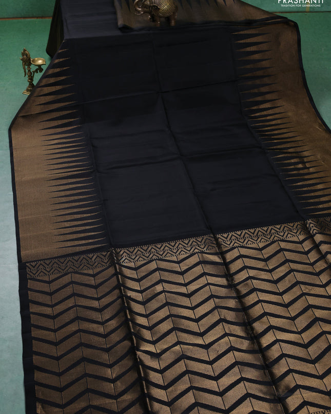 Pure soft silk saree black with plain body and temple design zari woven border