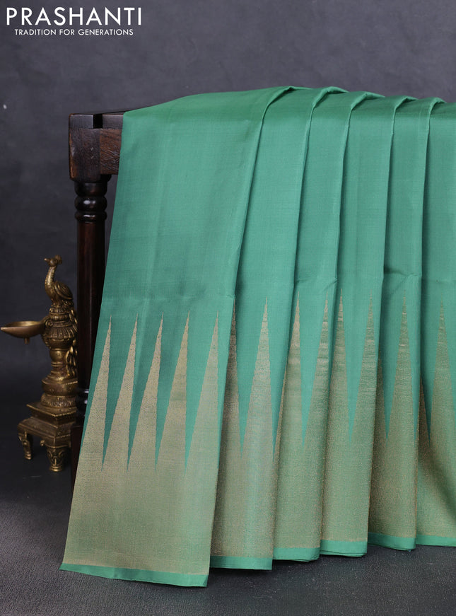Pure soft silk saree pastel green with plain body and temple design zari woven border