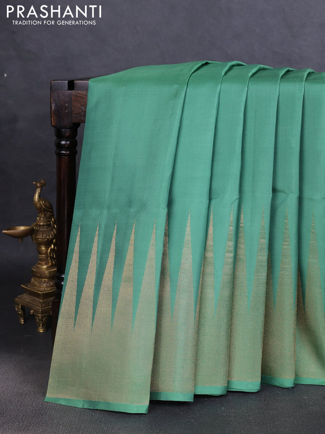 Pure soft silk saree pastel green with plain body and temple design zari woven border
