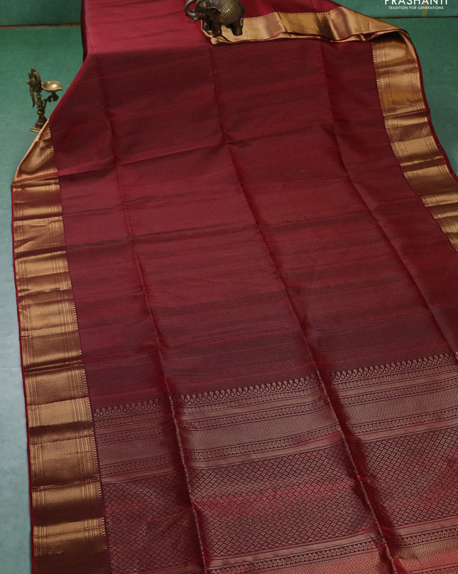 Pure soft silk saree maroon with allover zari weaves and zari woven border